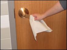 Open door handle with paper towel