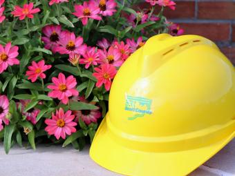 September flowers and a hard hat.