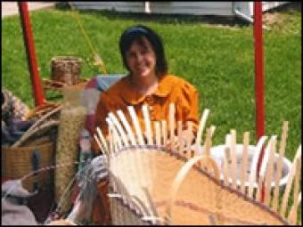 Woman making a basket.