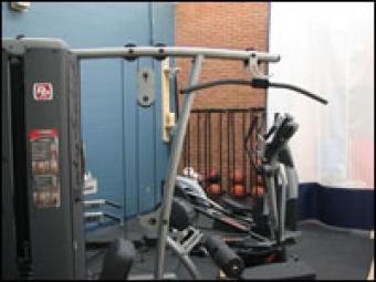 A stationary weight set and workout equipment.