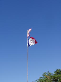 The U.S. and Iowa flags flying at the shelter.