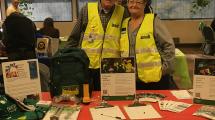 Members of CERT in front of literature table.