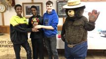 photo of chili cook off winners with smokey the bear